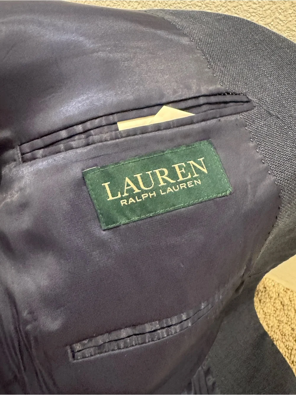 Lauren Ralph Lauren is a gray-blue suit jacket/blazer w/ classic 2button closure